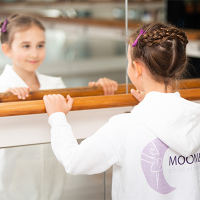 Ballet student holding the barre